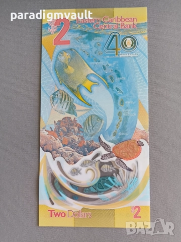 Банкнота - Източни Кариби - 2 долара (юбилейна) UNC | 2023г., снимка 3 - Нумизматика и бонистика - 52254665