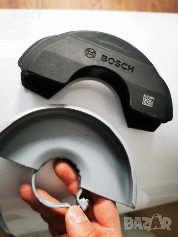 Предпазител Bosch за ъглошлайф125 + кожух , снимка 2 - Други инструменти - 53674075