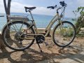 Оригинален швейцарски електрически велосипед с ретро дизайн и  канадско задвижване от Bionx, снимка 1