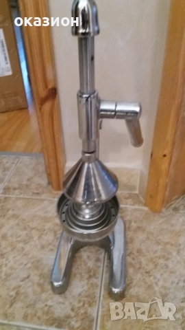 Ръчна цитрус преса