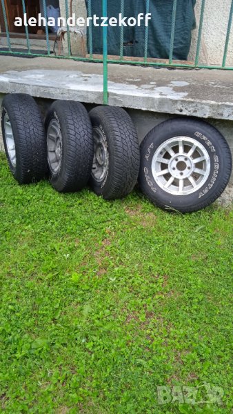 Гуми с джанти р215/75/15  100 S m+s  за Cherokee, снимка 1