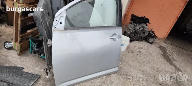 Врата предна лява Daihatsu Sirion II 1.3 - 91к.с., снимка 2 - Части - 56181430