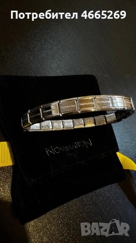 Гривна Nomination.