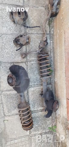 Окачване амортисьори ляв десен шенкел колове предни спирачни апарати  супорти  бмв е34 525 бензин 