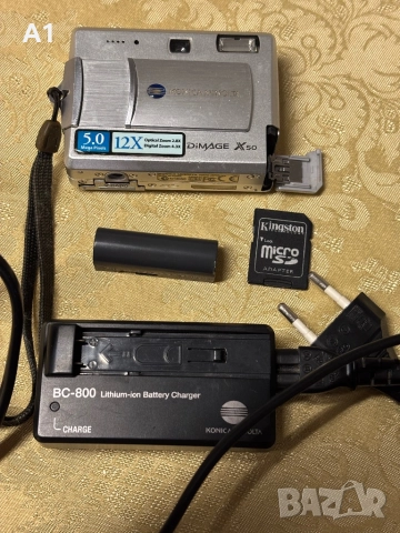 KONICA MINOLTA DIMAGE X50, снимка 10 - Фотоапарати - 52466694