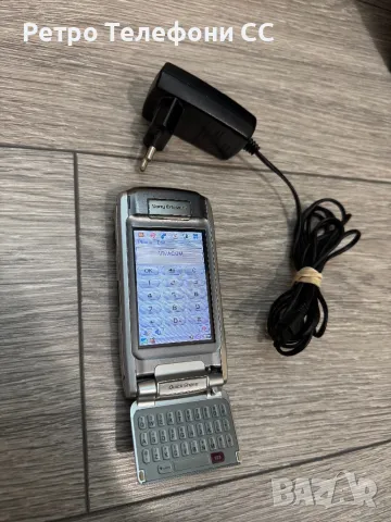 Сони Ериксон p910i Sony Ericsson Ориг зарядно 2бр батерия една нова бонус, снимка 1