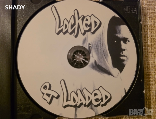 Get rich or die tryin Колекционерски реквизитен албум – Young Caesar / Locked & Loaded (филмов проп), снимка 3 - Колекции - 51828758