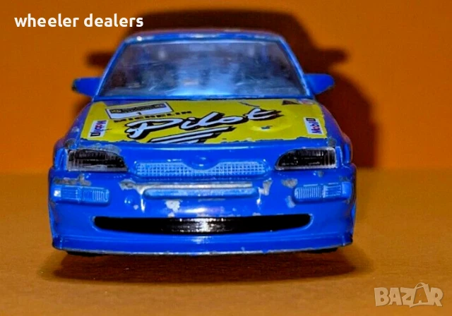 Метална количка Bburago FORD ESCORT RS COSWORTH 1/43, снимка 4 - Колекции - 50835348