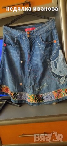 Ефектна дънкова пола, снимка 5 - Поли - 41612576