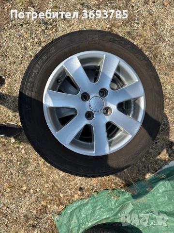 Джанти 4X100 ET 38 14R., снимка 4 - Гуми и джанти - 51409884