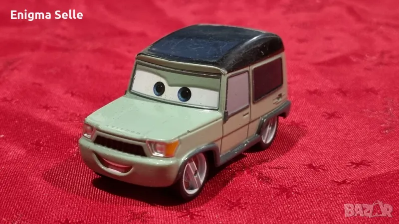 Метална колекционерска кола Disney Store CARS 2 MILES AXLEROD 1:43, снимка 1