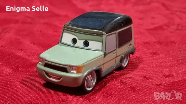 Метална колекционерска кола Disney Store CARS 2 MILES AXLEROD 1:43
