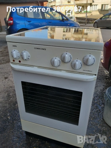 Печка със керамични котлони и вентилатор AEG 