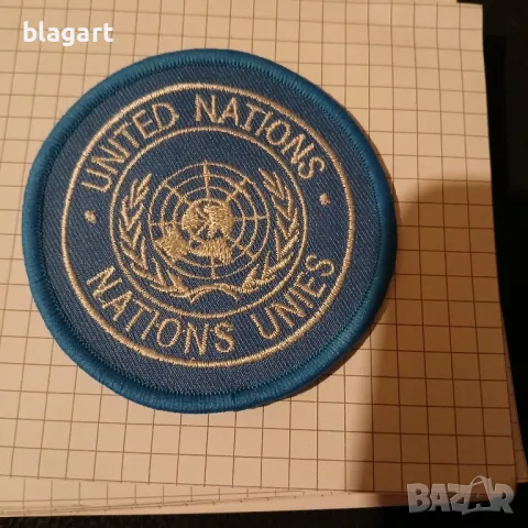 Емблема -сини каски ООН