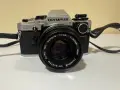 Фотоапарат Olympus OM-10 с обектив Olympus Zuiko MC Auto-S 50mm f/1.8. , снимка 1