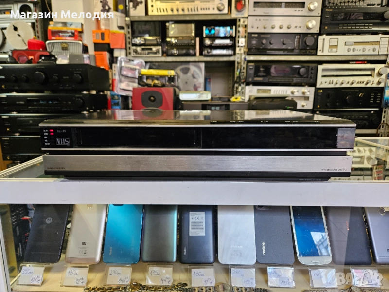 Видео Bang & Olufsen Hi-Fi Beocord VHS 91.2 Работи, произвежда, дисплея му не работи. Има нужда от п, снимка 1