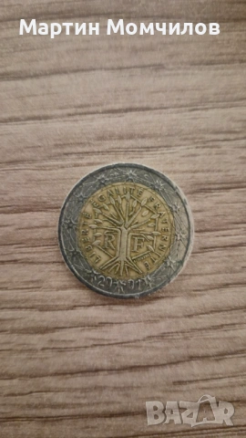 Монета от 2 евро "Дървото на живота" 2001 употребявана с грешки при сечене 