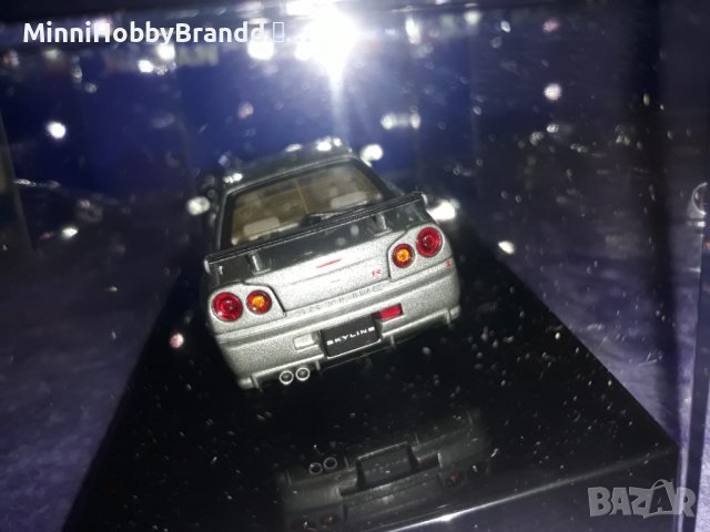 NISSAN  SKYLINE GT-R R 34 V spec AUTOart 1.43  Top Model , снимка 8 - Колекции - 39258739