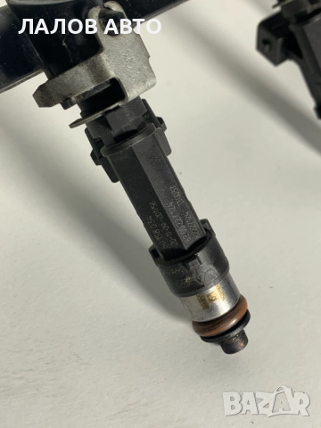 Горивна рейка дюзи 1.4 1.6 бензин Рено Дачия Renault Dacia 0280158034 P8200494284, снимка 2 - Части - 52627072