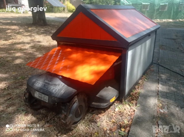 гараж за косачка робот