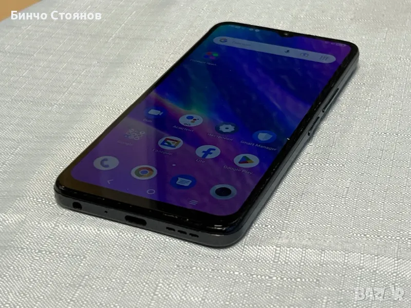 TCL 405, снимка 1