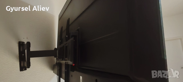 Продавам нов смарт телевизор купен е от Германия със нова стойка за стена, 4K UHD 55 inch zoll , снимка 13 - Телевизори - 52632128