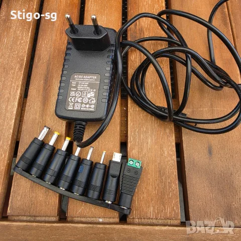 Универсален захранващ адаптер AC/DC 24V 1A (24W) + комплект сменяеми накрайници (НОВ
