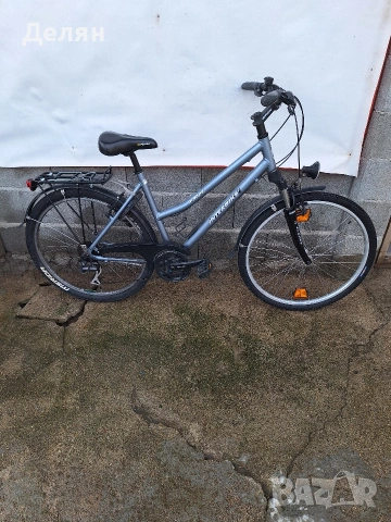 Велосипед INTERBIKE 26",алуминиева рамка,преден амортисьор,скорост 3×8,монтаж SHIMANO ACERA,фар