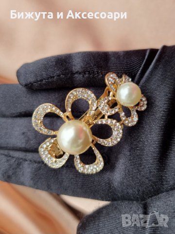 Красива метална шнола в златисто с перли и кристали и закопчаване с френски механизъм 