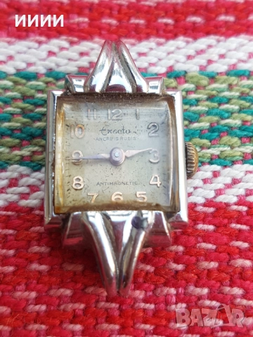 Часовник Exacto