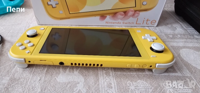 Nintendo Switch Lite Yellow 32 GB + 128GB карта, снимка 3 - Nintendo конзоли - 52986976