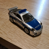 Метална количка Siku 1006 Porsche 911 Carrera S Немска Полиция, снимка 1 - Колекции - 36425825