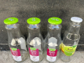 Стъклени бутилки 1 литър, снимка 1 - Буркани, бутилки и капачки - 44622564
