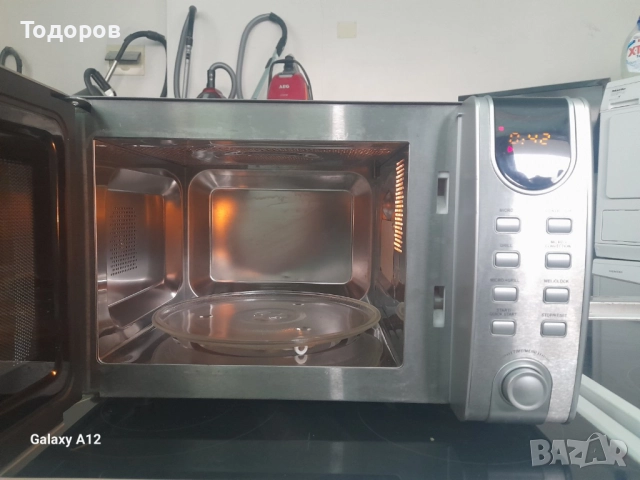 Микровълнова печка с грил Clatronic, снимка 2 - Микровълнови - 51710764