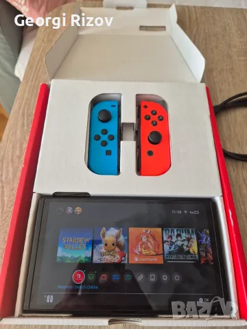 Nintendo Switch OLED Red/Blue, снимка 3 - Nintendo конзоли - 56410364