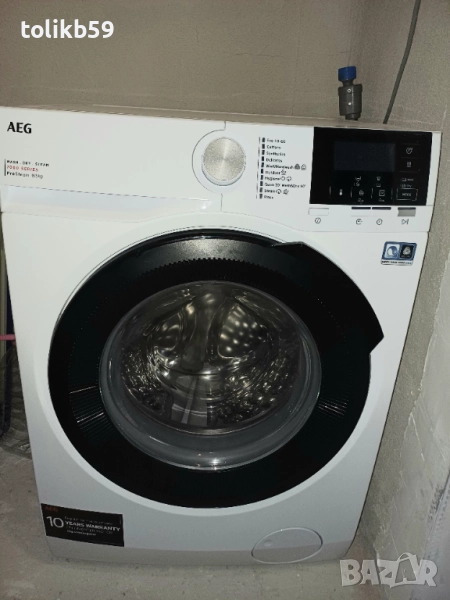 AEG пералня със сушилня, модел LWR 71944B, почти нова, снимка 1