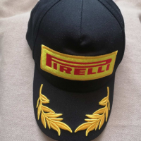 Черна и червена качествена шапка с надпис Пирели Pirelli марка гуми на атомобил, снимка 2 - Аксесоари и консумативи - 36268294