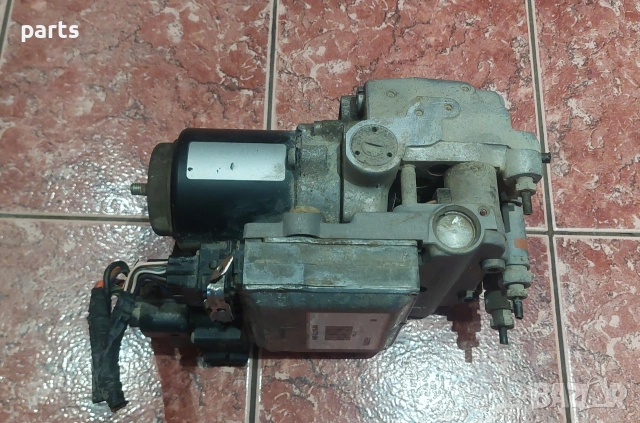 ABS Помпа Форд Мондео - F4RF2C219AN - B552551 - 8553077K - 40623560 - 93BB2M110AH, снимка 2 - Части - 53463379