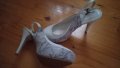 Елегантни бели обувки, снимка 1 - Дамски обувки на ток - 41041629
