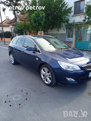Опел Астра Спорт Тауър, снимка 6 - Автомобили и джипове - 52405212