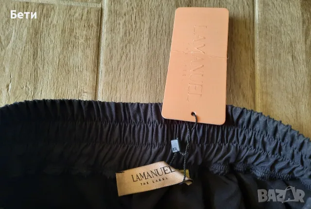 Черна пола (тип: балон) с джобове на Rebrand Boutique , снимка 2 - Поли - 55960113
