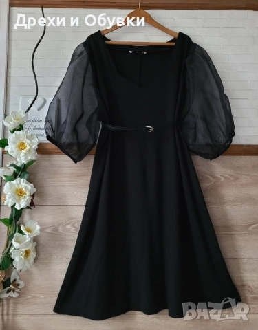 Официална черна рокля с ефектен ръкав 