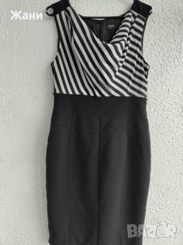 Елегантна рокля за офис