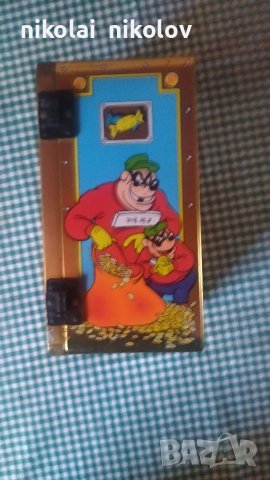 Метална кутия(сейф)на Чичо Скрудж Нестле и Дисни , снимка 2 - Антикварни и старинни предмети - 39040433