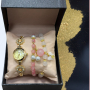 Луксозен дамски комплект часовник с камъни цирконии и 2 броя гривни с естествени камъни в бяло и роз, снимка 1 - Бижутерийни комплекти - 44749998