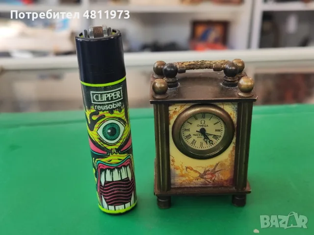 Малък механичен настолен часовник омега omega