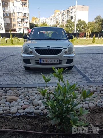 Daihatsu Sirion 1,0i, 58к.с, снимка 10 - Автомобили и джипове - 52973230