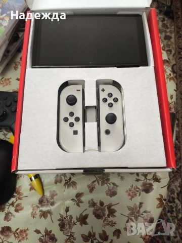Хакнато Nintendo Switch OLED-128gb, снимка 4 - Nintendo конзоли - 53133192