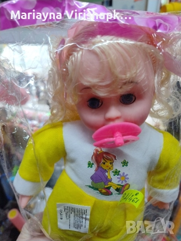 Продавам спящо бебе с биберон.