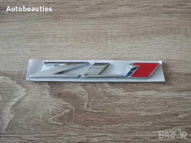Chevrolet Camaro ZL1 сребриста емблема